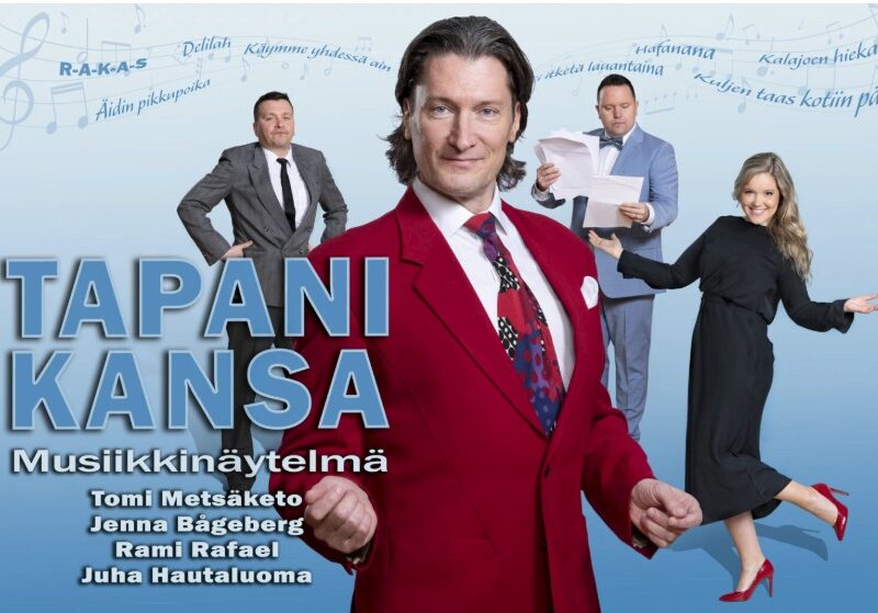 Näyttelijä Tomi Metsäketo esittää Tapani Kansaa punaisessa puvussa.